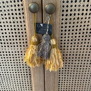 Three decorative fabric tassels blue, yellow, gold new with and without tags